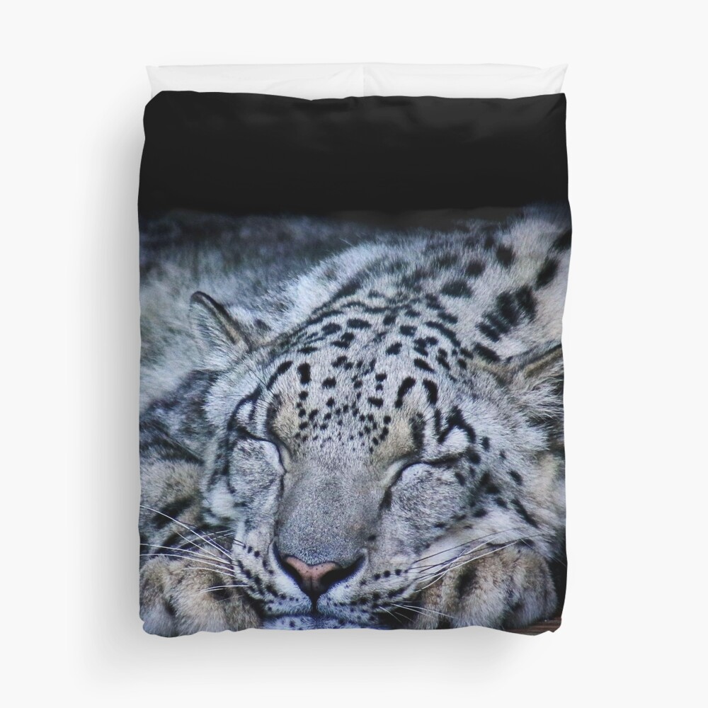 Sleepy snow leopard Duvet Cover