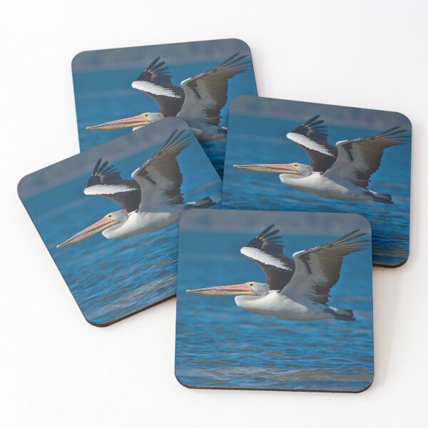 Item preview, Pelicans A White Pelican Bird Flying Low Over The Blue Water - Portrait designed and sold by Jason Gilbert.