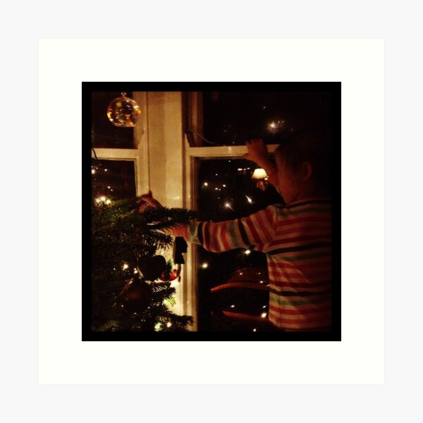 Item preview, Putting decorations on the tree designed and sold by Robert Steadman.