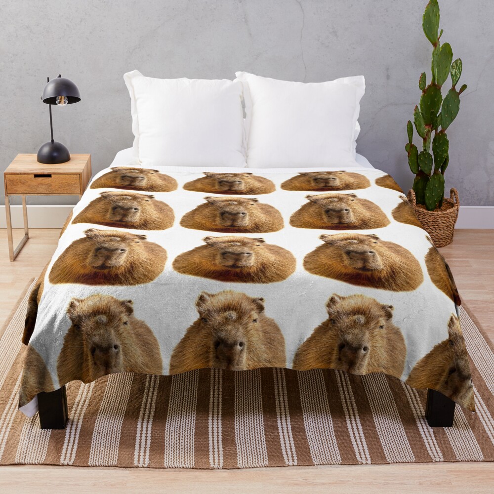 Capybara dozing in the sunshine Throw Blanket