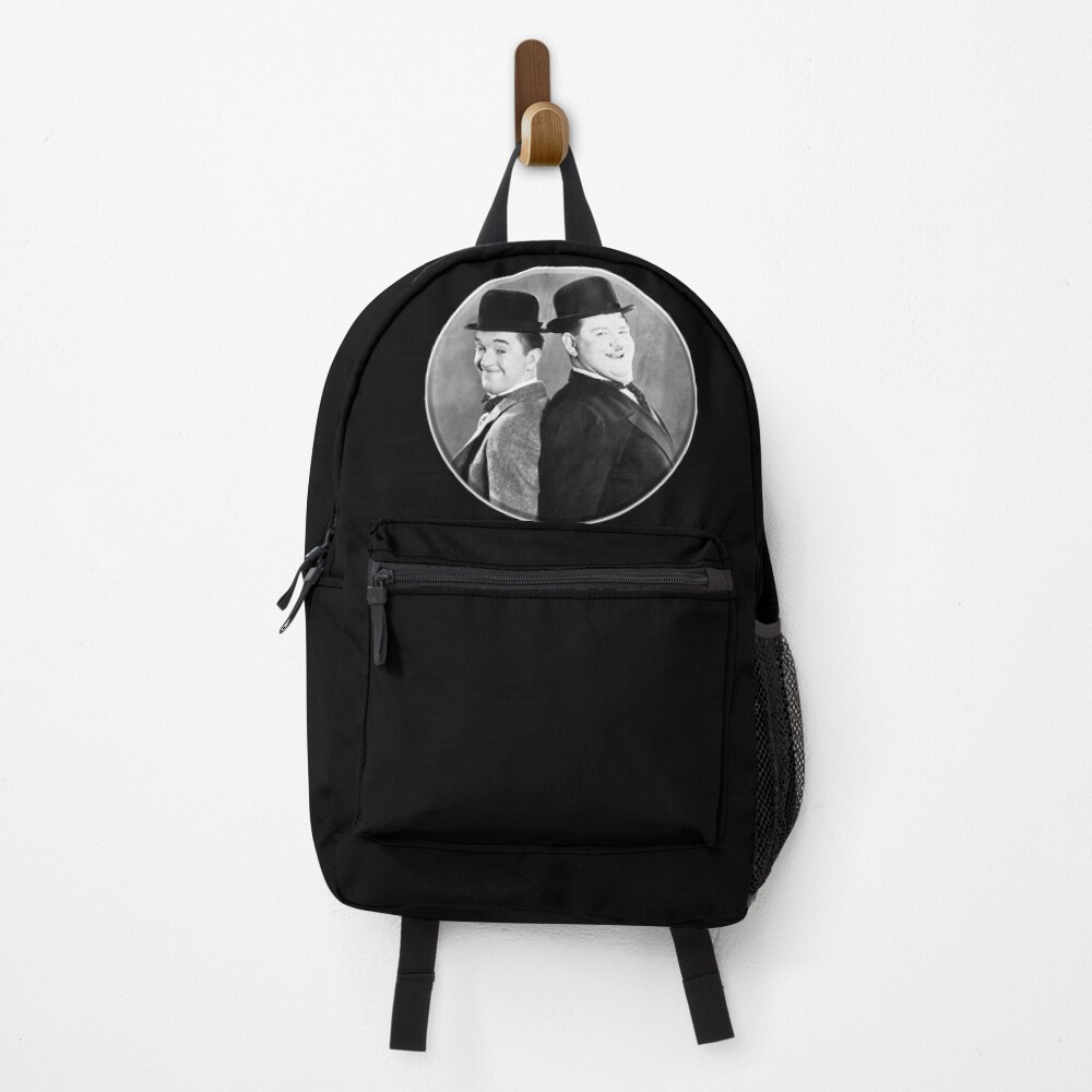 LAUREL AND HARDY. Stan Laurel and Oliver Hardy in their 1939 feature film called The Flying Deuces. Backpack