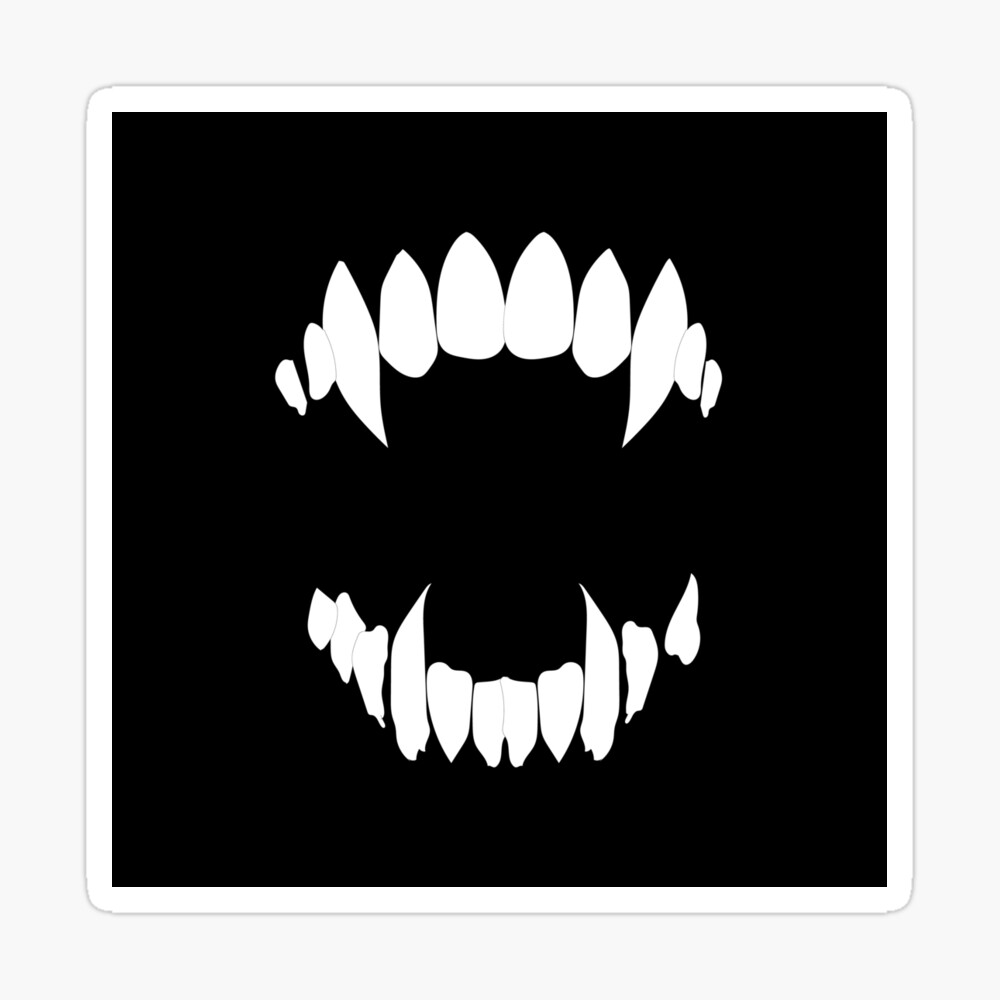 Vampire teeth on black background 