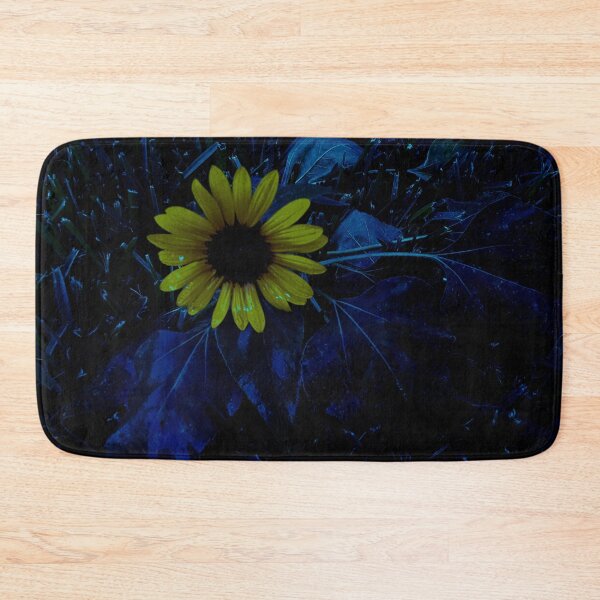 Item preview, A lonely bright yellow sunflower laying in the dark grass designed and sold by Cavity .exe.