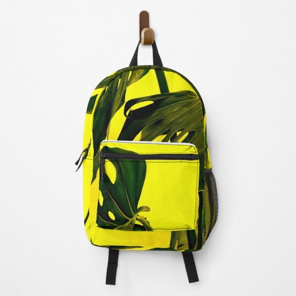Item preview, Monstera pot plant with leaves in casual fashion on yellowt isolated on white background. designed and sold by Brian Scantlebury.