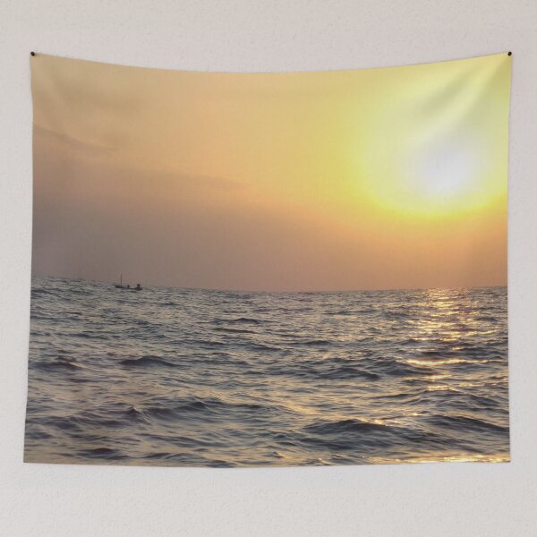 Item preview, Beautiful sunset on the sea with a boat in the distance designed and sold by Artlajf.