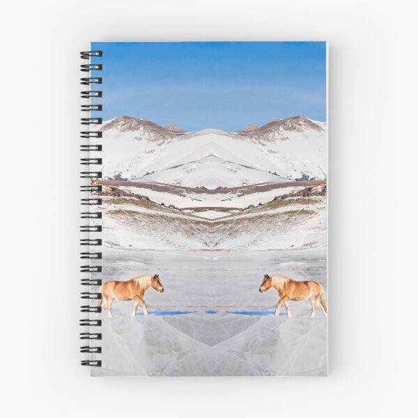 Item preview, Brown ponies in snowy plateau roaming on frozen cracked lake blue sky on background designed and sold by Flavio Vieri.