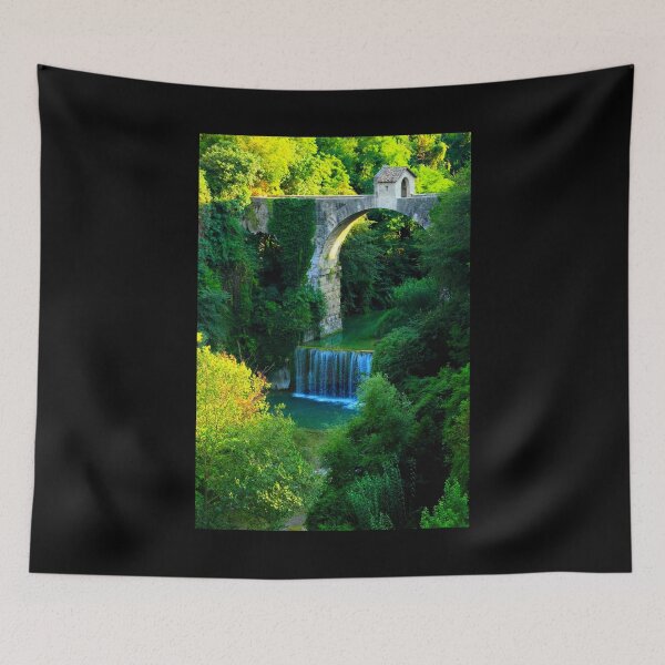 Item preview, View of Cecco Bridge in Ascoli Piceno with waters of Castellano river flowing below and vegetation designed and sold by Kristina Drozd.