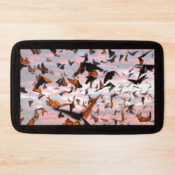 Item preview, swarm of monarch butterflies, Danaus plexippus group during sunset designed and sold by DottedYeti.
