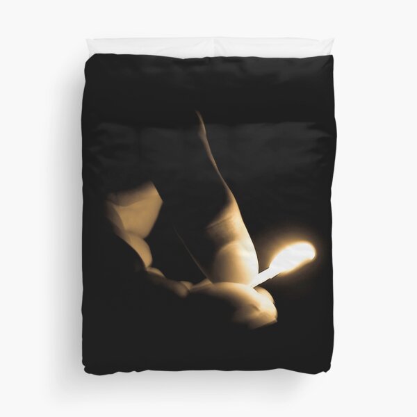 Photograph Sepia Tone Hand and Fingers with Lit Fire Match Duvet Cover
