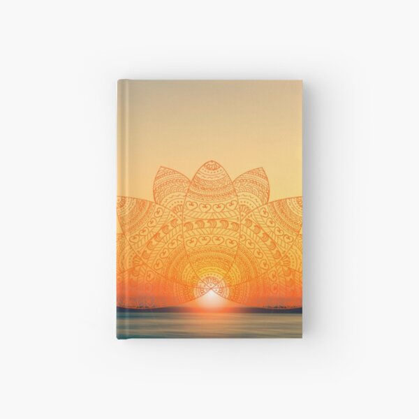 Orange-golden lotus doodle mandala on blurred sunset with sun flare Hardcover Journal