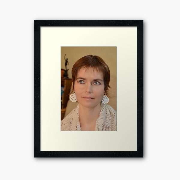 Girl With The Crocheted Earrings Framed Art Print