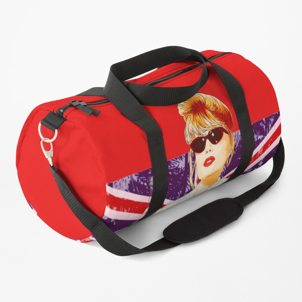 Patsy Stone with the English flag Union Jack in Absolutely Fabulous Duffle Bag
