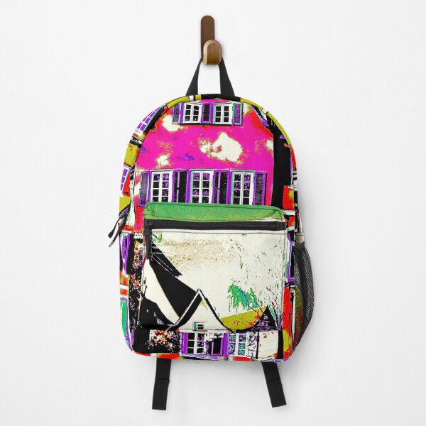 Colorful apartment buildings during day time Backpack