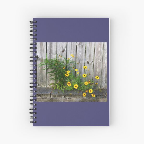 Yellow Flowers on a Gray Fence Spiral Notebook