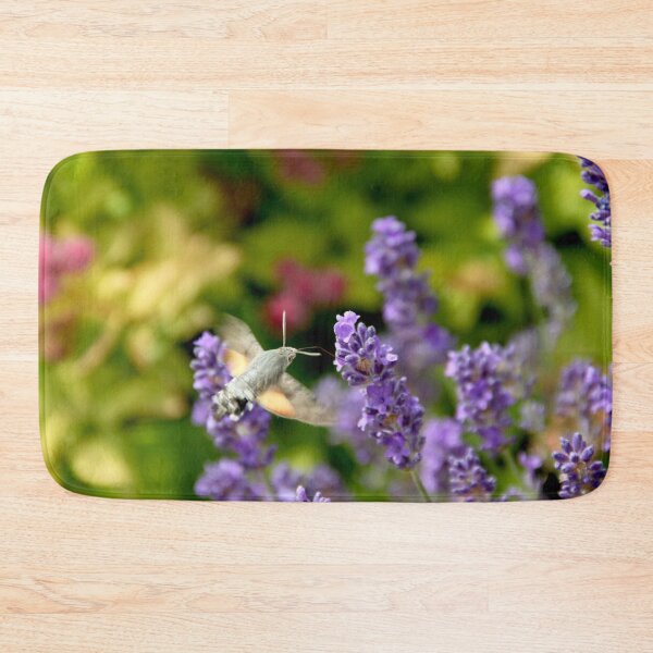 Item preview, Hummingbird hawk-moth in flight on lavender flowers designed and sold by EstelleRossetti.