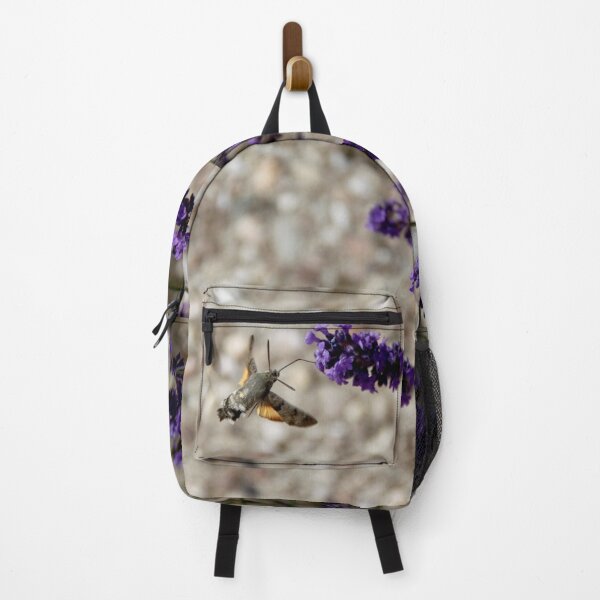 Item preview, Hummingbird hawk-moth in flight on lavender flowers designed and sold by EstelleRossetti.