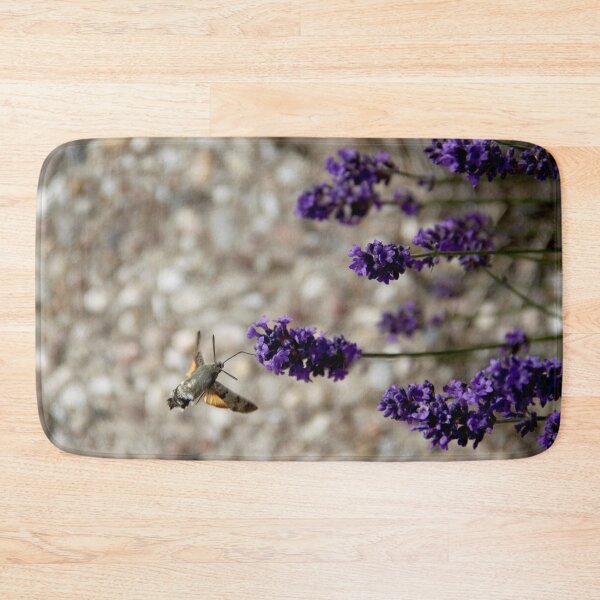 Item preview, Hummingbird hawk-moth in flight on lavender flowers designed and sold by EstelleRossetti.