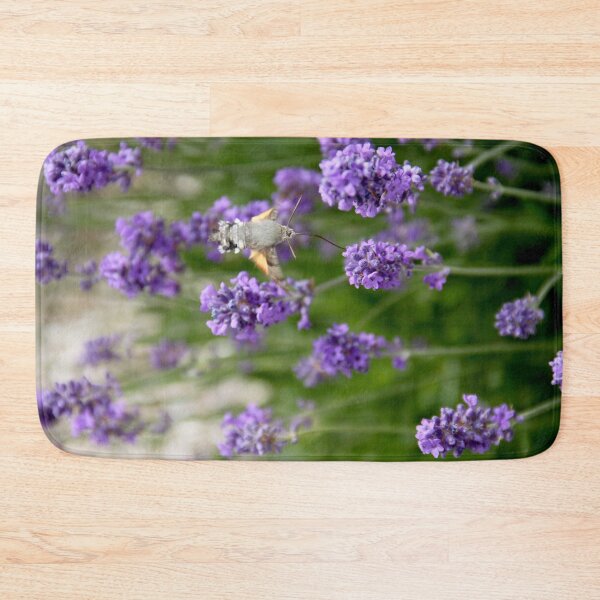 Item preview, Hummingbird hawk-moth in flight on lavender flowers designed and sold by EstelleRossetti.