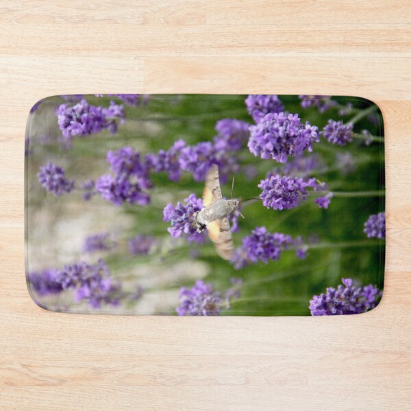 Item preview, Hummingbird hawk-moth in flight on lavender flowers designed and sold by EstelleRossetti.