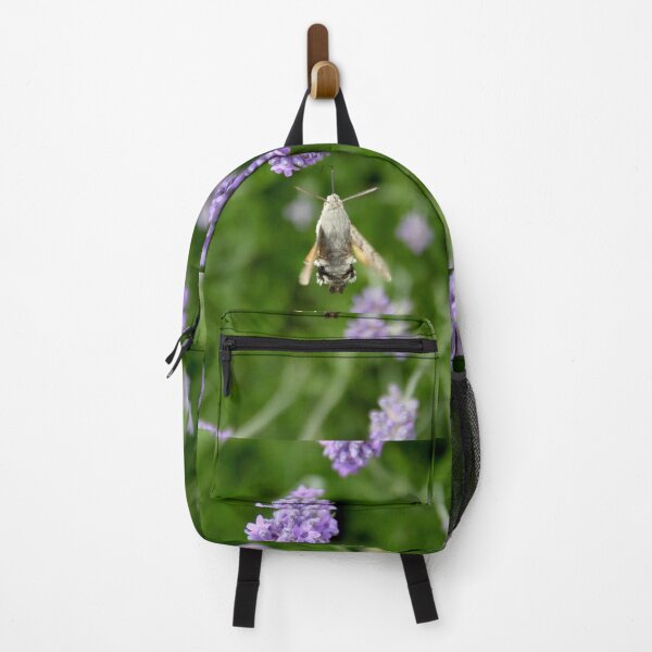 Item preview, Hummingbird hawk-moth in flight on lavender flowers designed and sold by EstelleRossetti.
