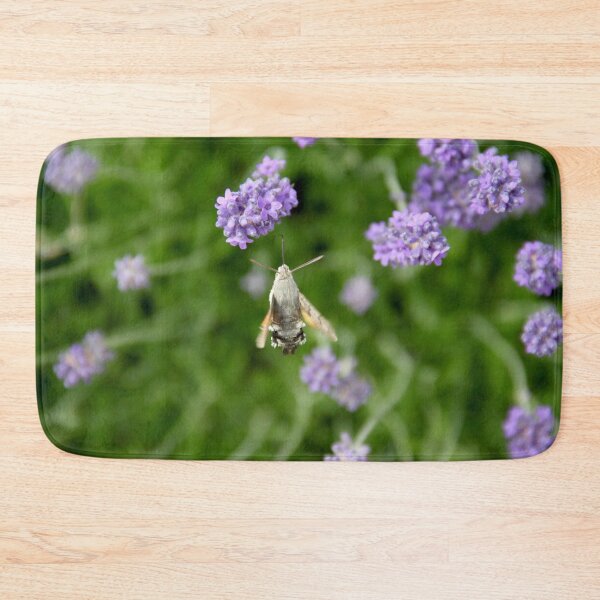 Item preview, Hummingbird hawk-moth in flight on lavender flowers designed and sold by EstelleRossetti.