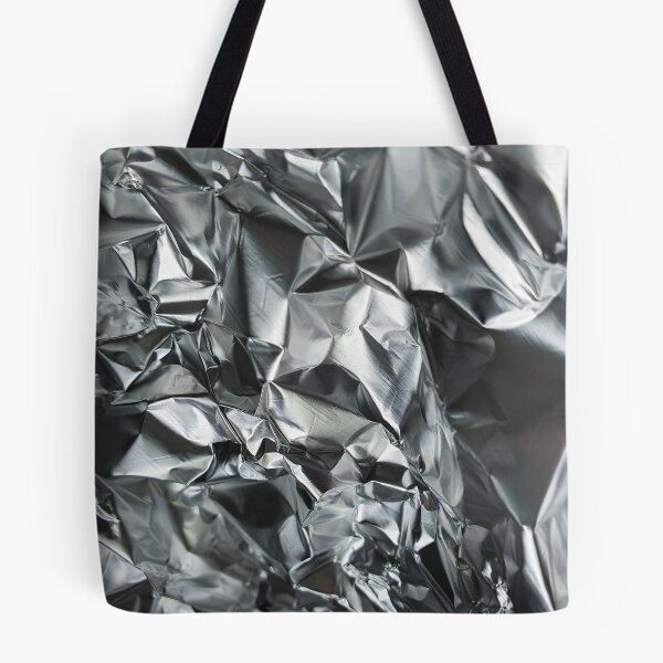Item preview, Close-Up Of Crumpled Up Aluminium Kitchen Foil designed and sold by AJ505.