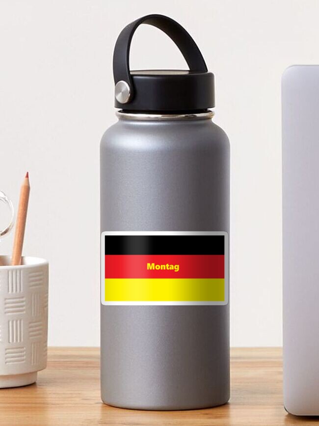 Thumbnail 1 of 3, Sticker, Montag - Monday in German, with a German flag background designed and sold by farmbrough.