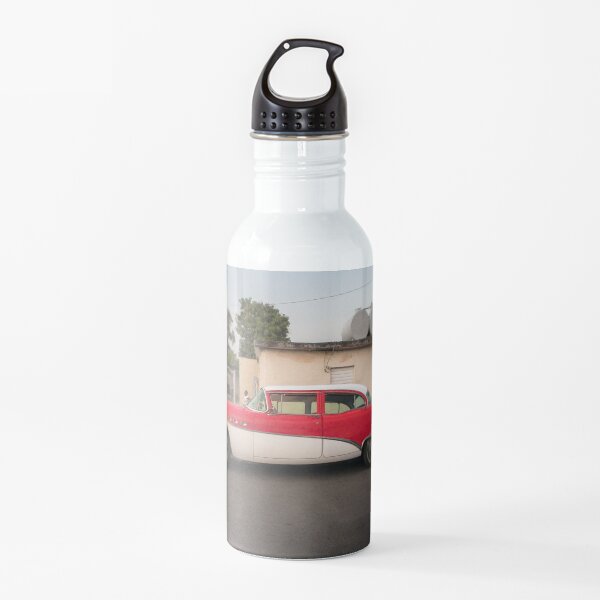 Neat vintage car in Cienfuegos, Cuba. Water Bottle