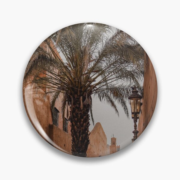 Item preview, palm tree in the middle of marrakech medina alleyway at sunset  designed and sold by Morocco Marrakech Photo Prints.