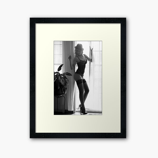 Elegant lady in ingerie wearing hat and holding a sigarette Framed Art Print