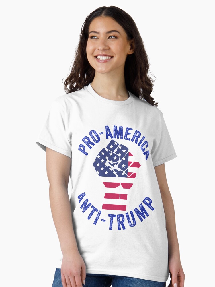 Imagen 1 de 7, Camiseta clásica con la obra Pro-America Anti-Trump -USA Flag BLM Logo, diseñada y vendida por Sutra-Lotus-Co.