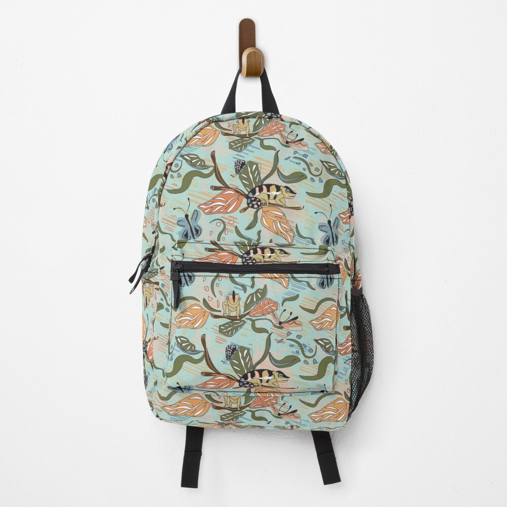 Madagascar Floral has butterflies and dragonflies with peach, orange and teal colors. This color palette matches with my Chameleon design. Backpack