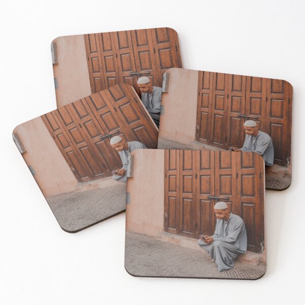Item preview, man setting next to his shop in marrakech souk market medina designed and sold by Morocco Marrakech Photo Prints.