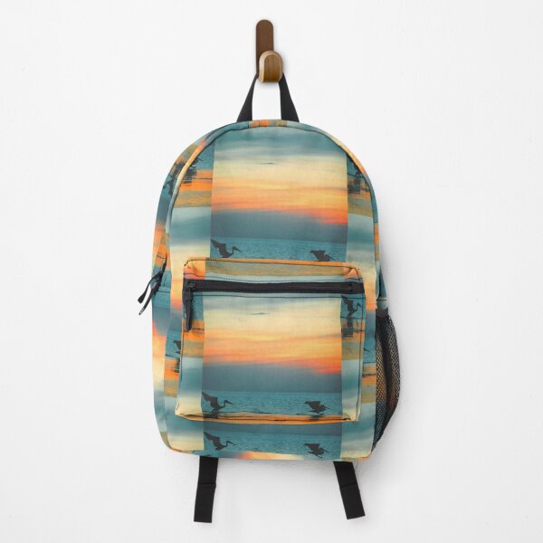 Pelicans landing in the shallows Backpack