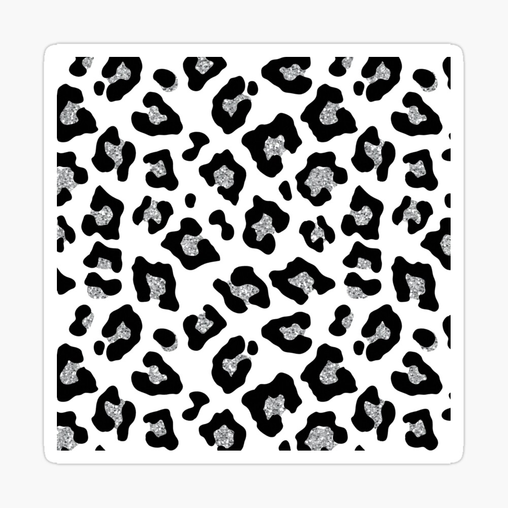 white and leopard trainers