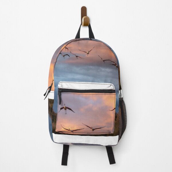 Item preview, Flying flamingos at sunset designed and sold by pietrofoto.