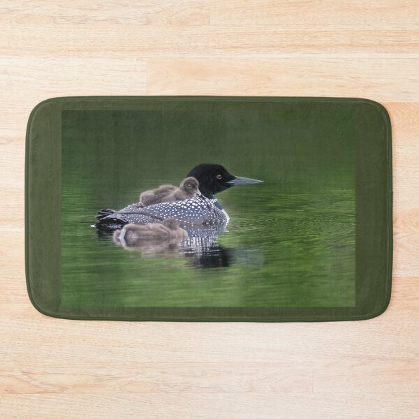 Item preview, Common Loon with her chicks in the Gile Flowage designed and sold by TheCurators.