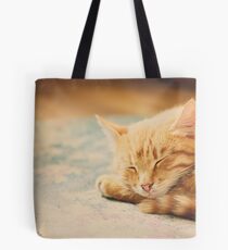 Little Red Kitten Sleeping On Bed Tote Bag