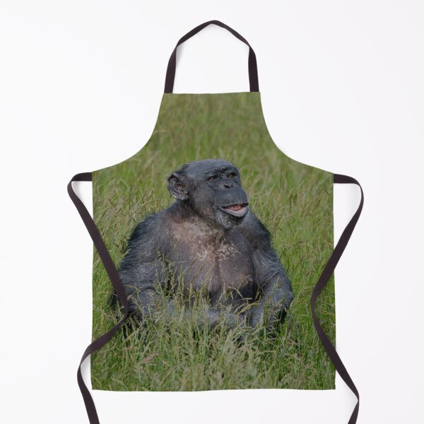 Item preview, Chimpanzee Sitting In The Grass designed and sold by rawshutterbug.