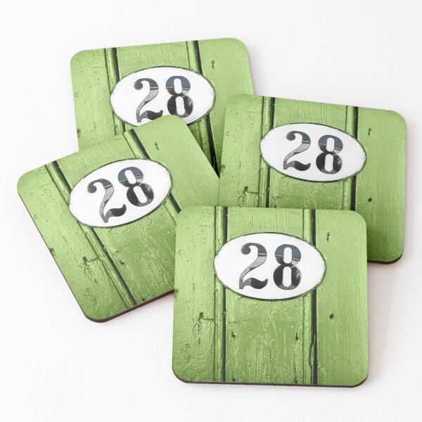 Item preview, Primer plano de una antigua puerta de madera verde con el número de dirección de la casa 28 designed and sold by Grégory DUBUS.
