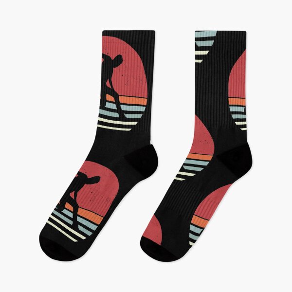 Item preview, Vintage Playful Jumping Man Silhouette Against Retro Sunset designed and sold by GravitiTees.
