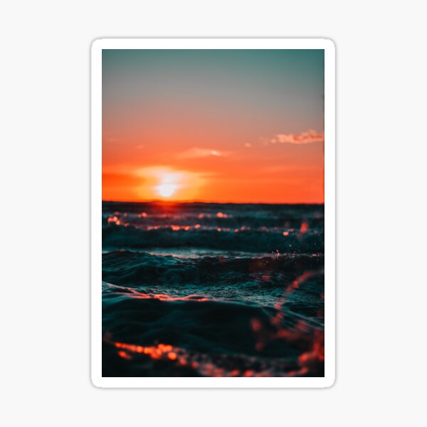 Orange sunset & blue ocean Sticker