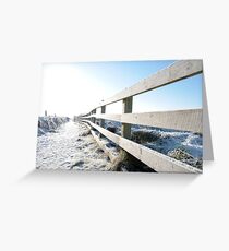 snow covered fenced path on cliff edge walk Greeting Card