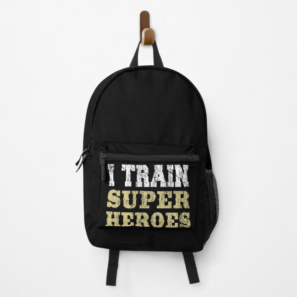 Item preview, I train Super Heroes Funny Teach Coach Gift Humor Saying designed and sold by MR20.