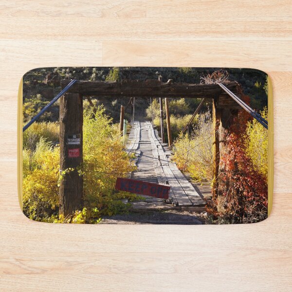 Item preview, An old bridge sits in the middle of Autumn Foliage designed and sold by MomentofPercep.