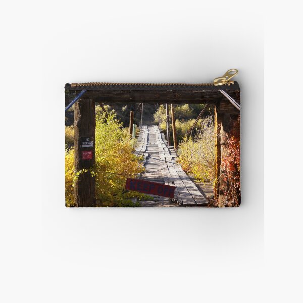 Item preview, An old bridge sits in the middle of Autumn Foliage designed and sold by MomentofPercep.