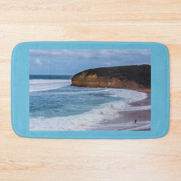 Item preview, A surfer runs away from the pro-waves at Bells Beach, Australia. designed and sold by shaynetwright.