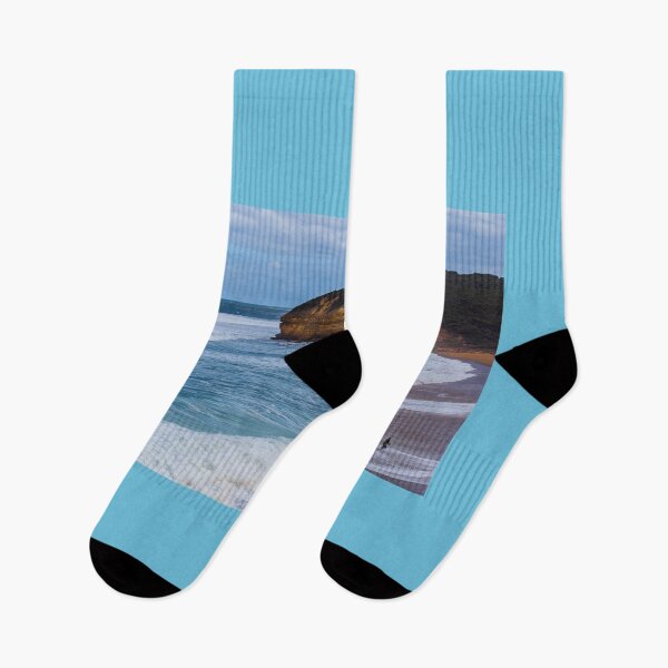 Item preview, A surfer runs away from the pro-waves at Bells Beach, Australia. designed and sold by shaynetwright.