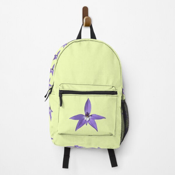 Orchid flower on yellow Backpack