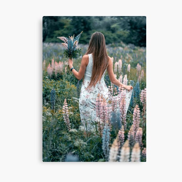 Girl in dream-line lupine flower foe;d Canvas Print